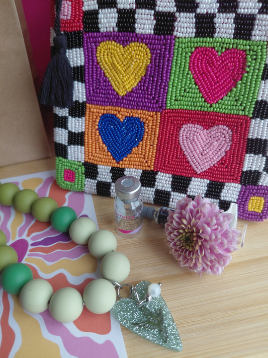 Collier Pop Love vert et sa pochette