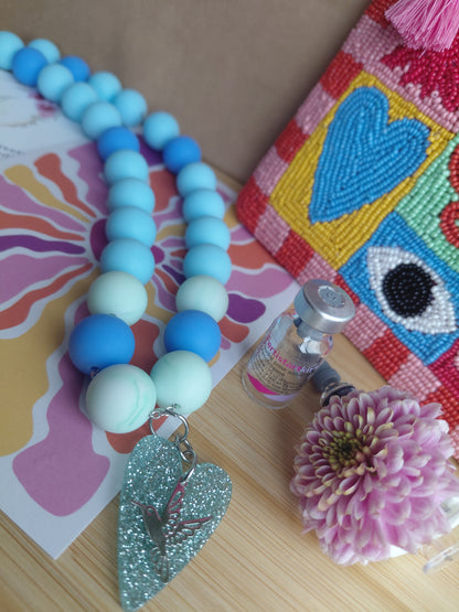 Collier Pop Love Bleu et sa pochette