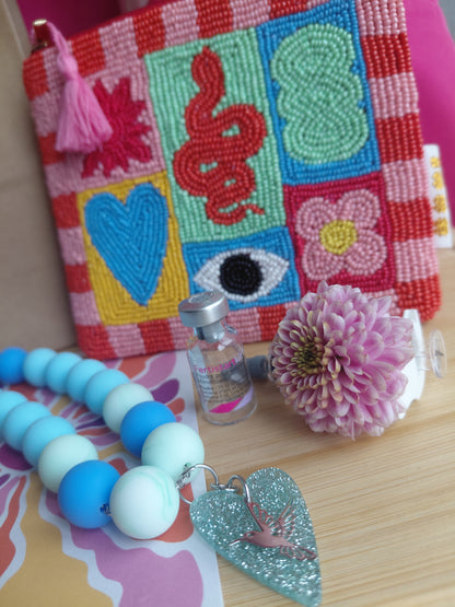 Collier Pop Love Bleu et sa pochette